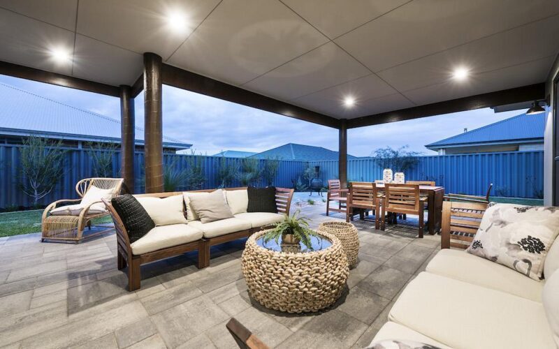brightly lit alfresco area with living/dining section