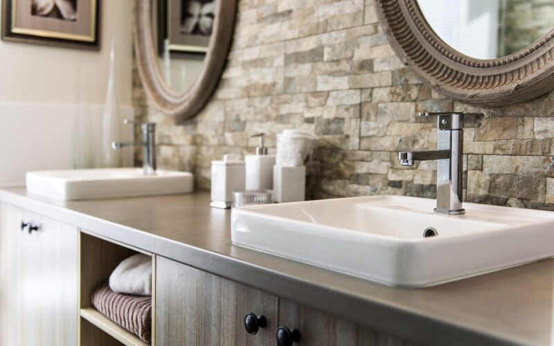 bathroom sink with stone splash back
