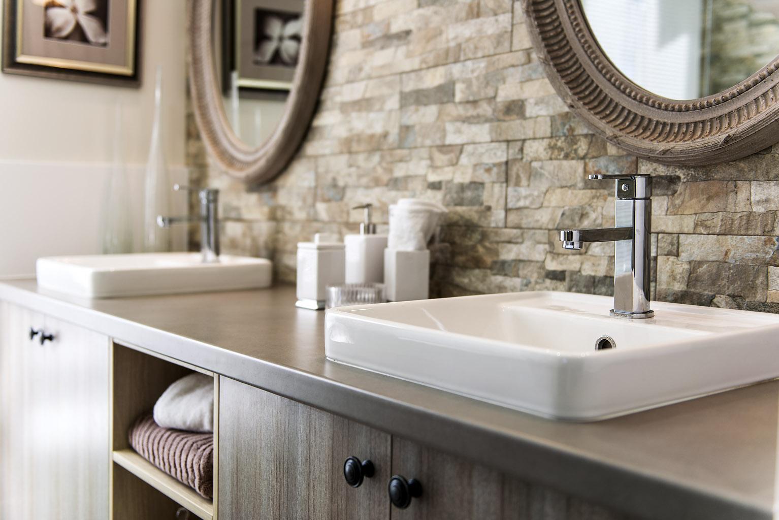 bathroom sink with stone splash back