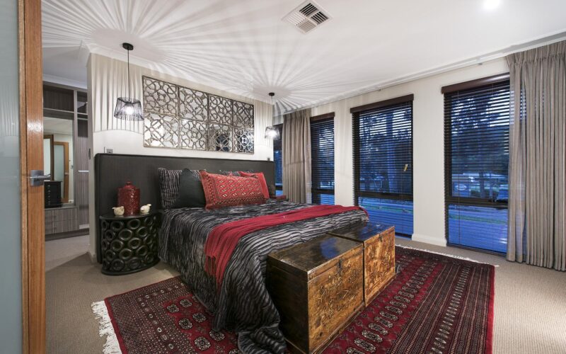 double bedroom with neutral furnishings and decor