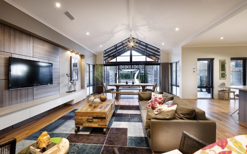 living room with raked ceilings