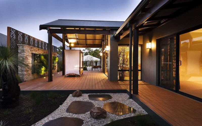 outdoor view of a rural building company home at sunset