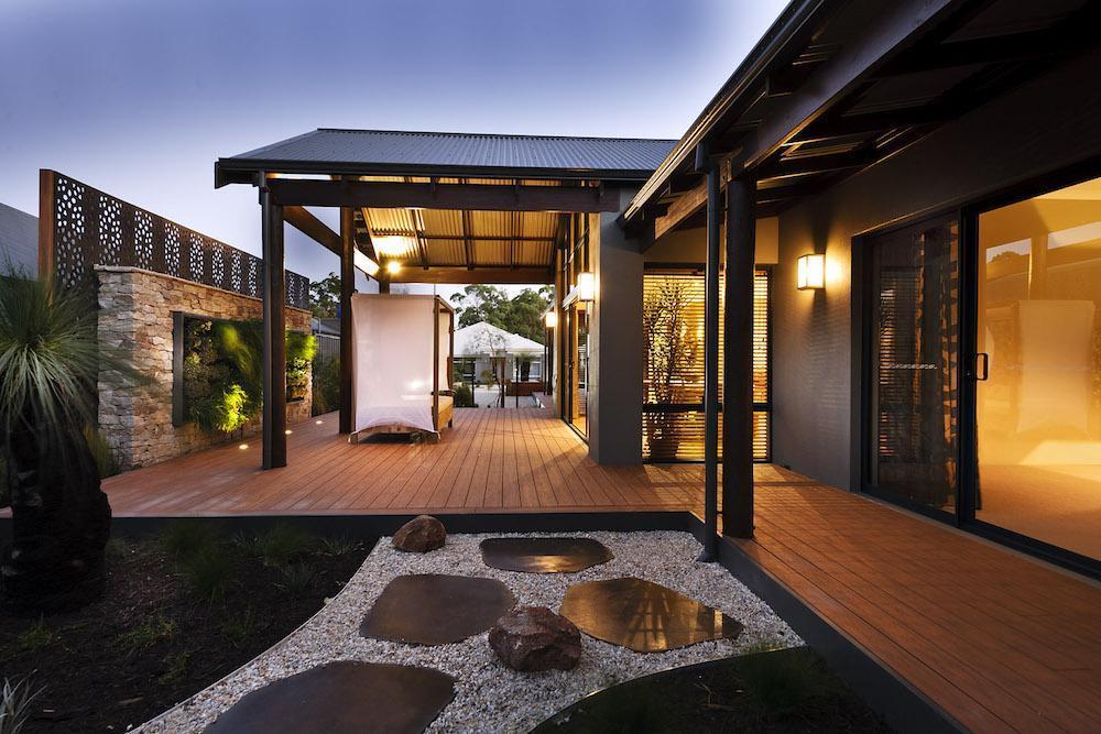 outdoor view of a rural building company home at sunset