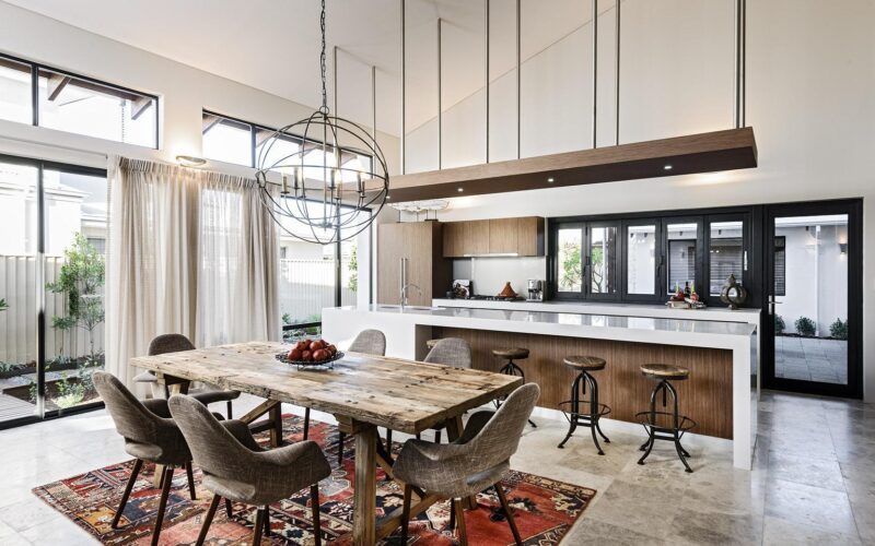 open plan living dining area with statement rug