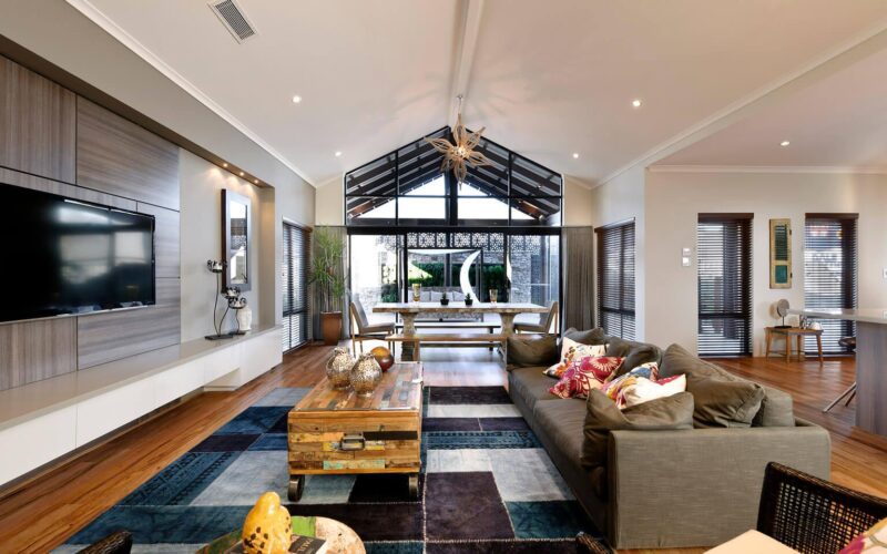 open plan living room with raked ceilings