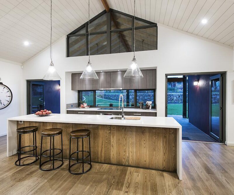 Island bench in a brightly lit kitchen