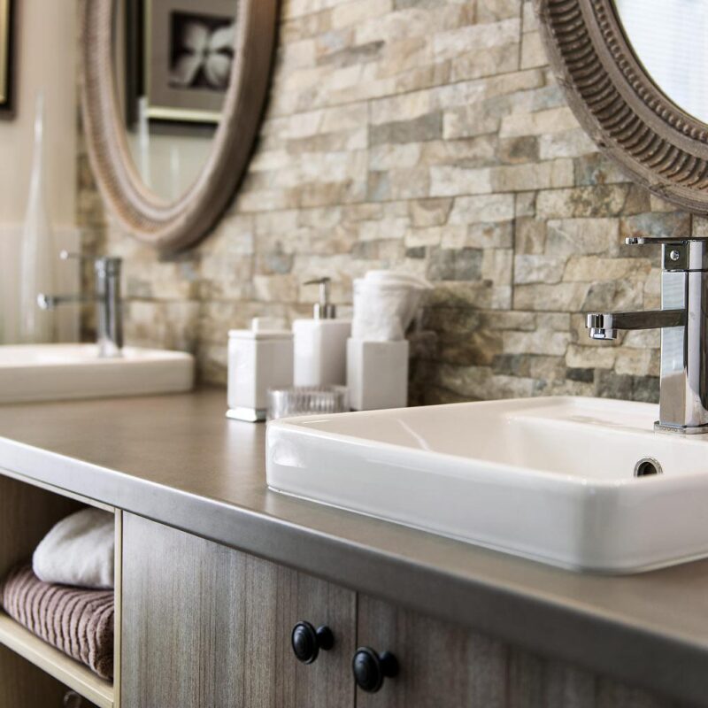 stone tiles wall and bathroom sink