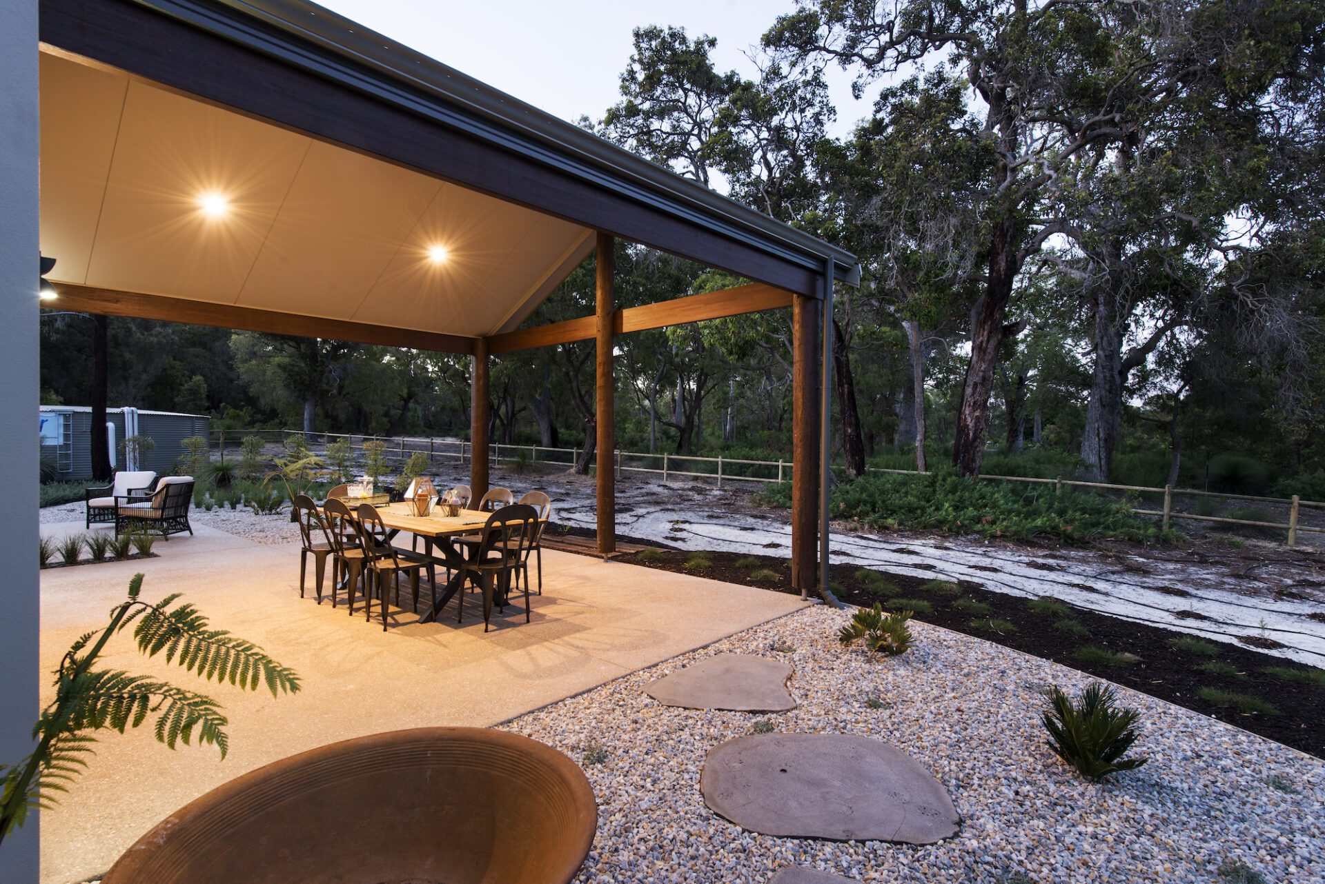 paved undercover alfresco area with gravel