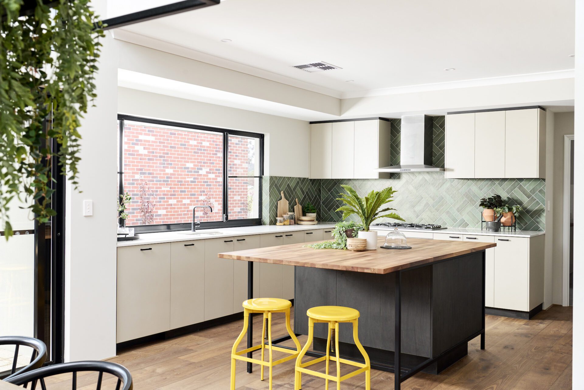 big kitchen with bi fold doors to give access to outdoor