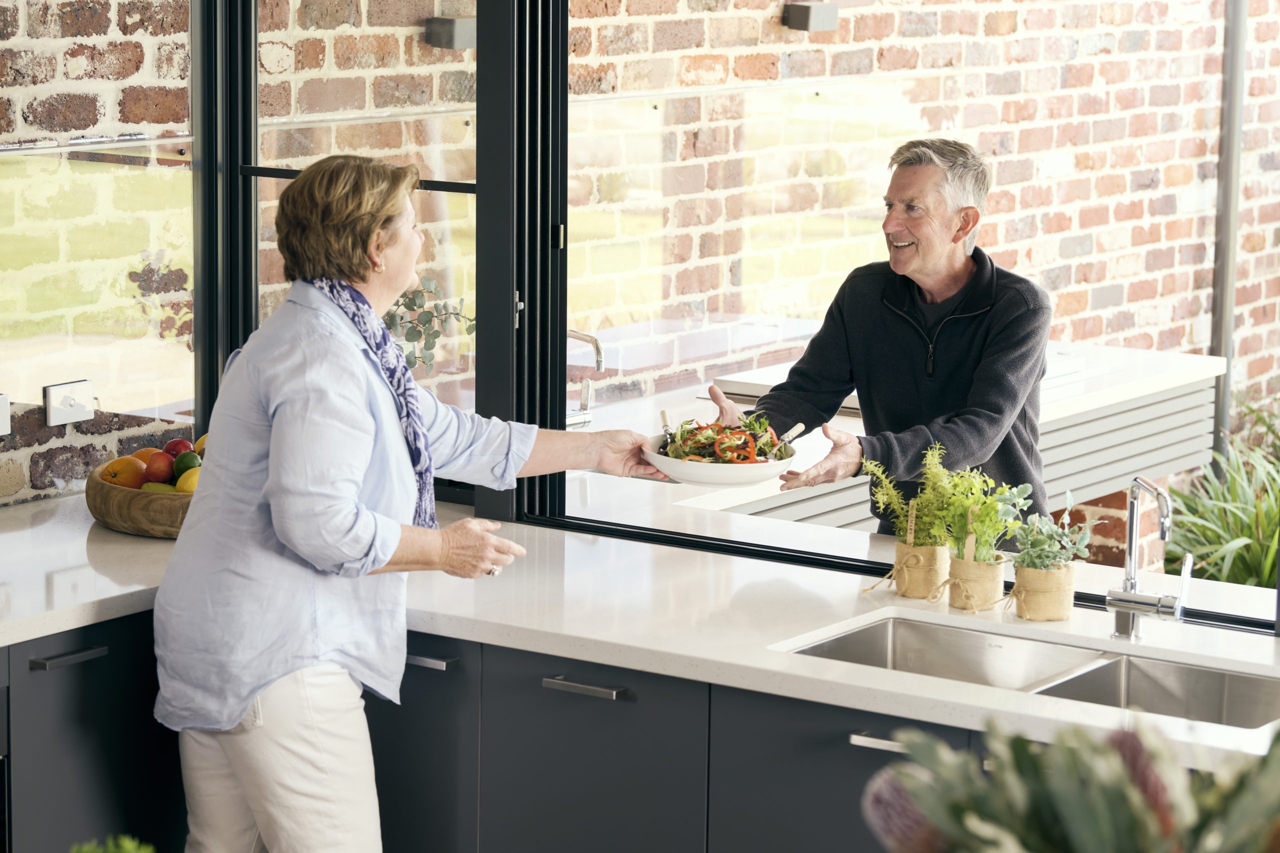 sliding kitchen window open to the outdoors