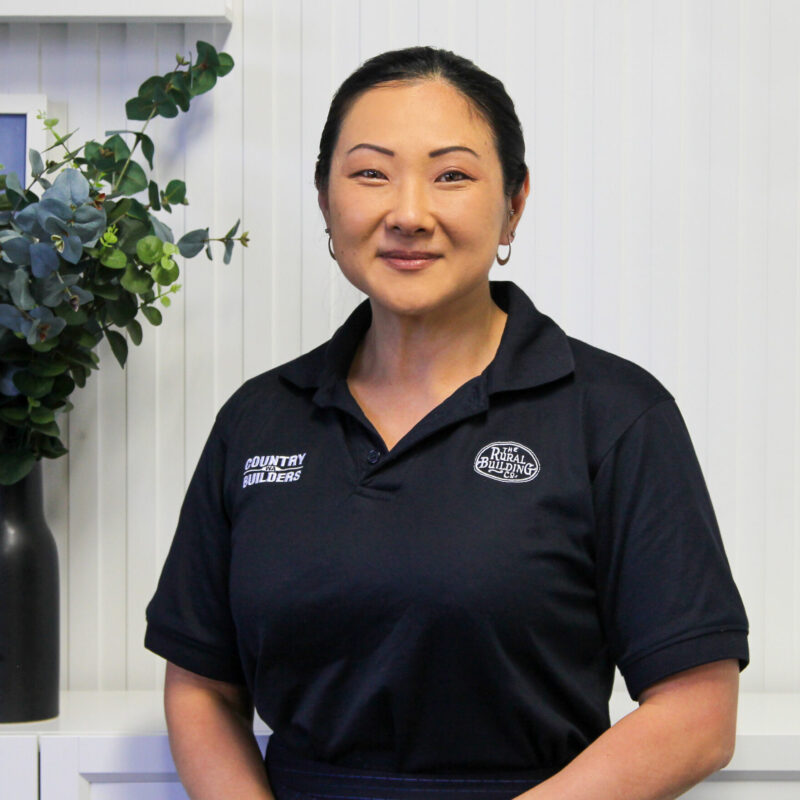 Portrait of a Country Builders team member in a branded polo shirt