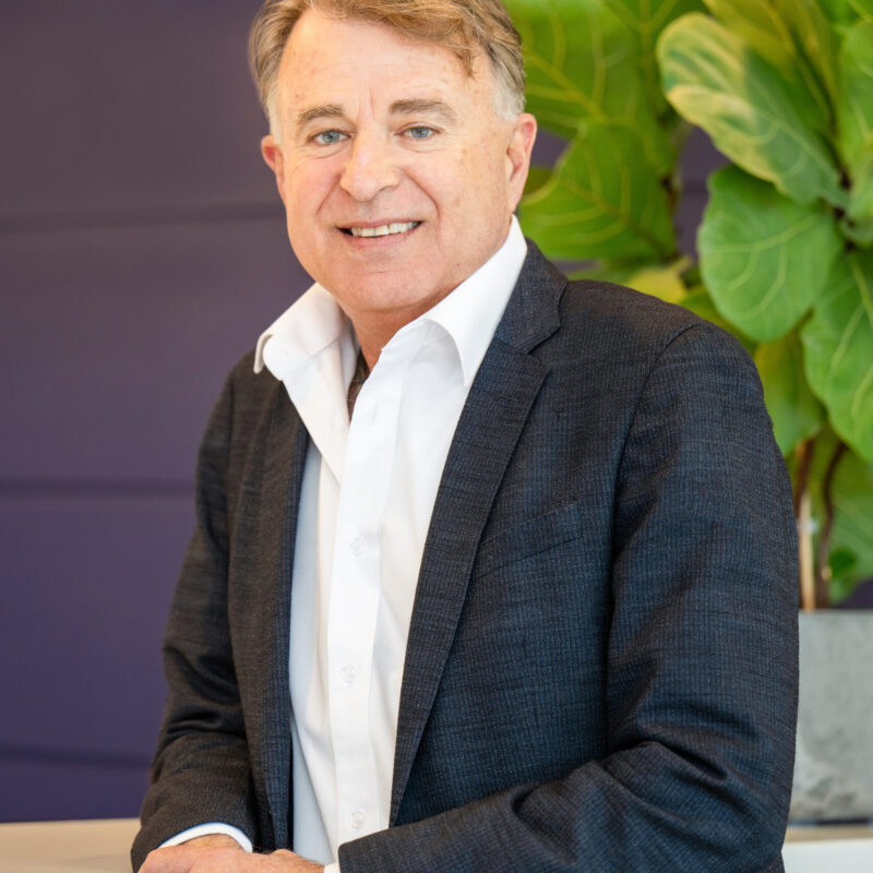 Portrait of a Country Builders team member in a suit jacket